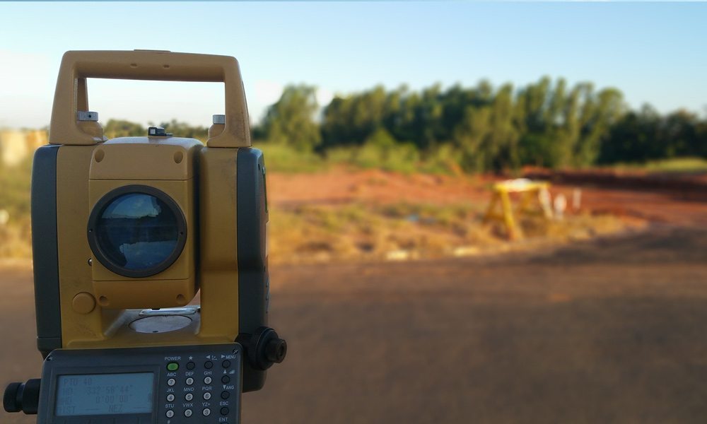 A laser level measuring an area
