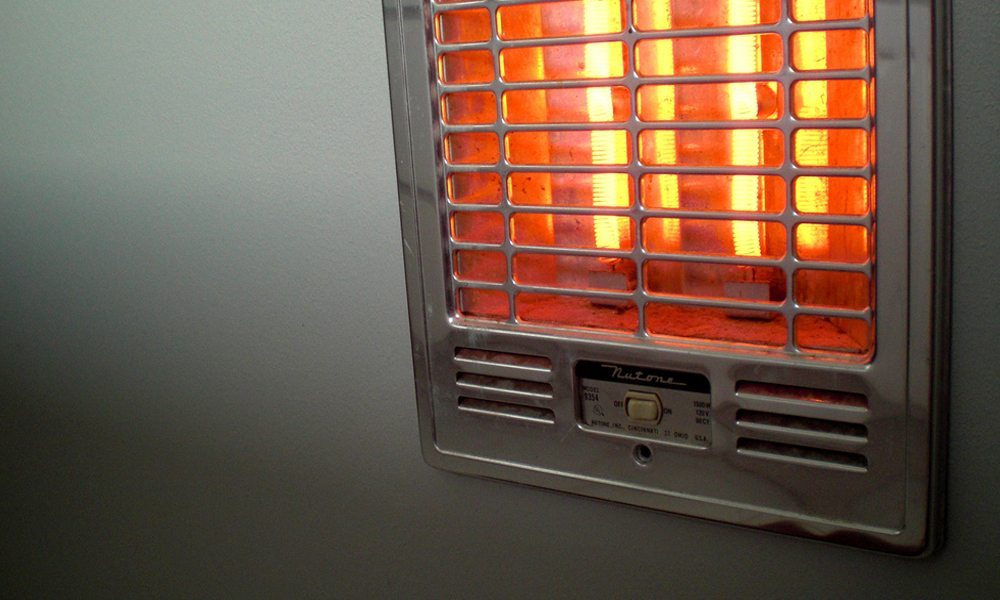 A close up of a Infrared Heater on a wall
