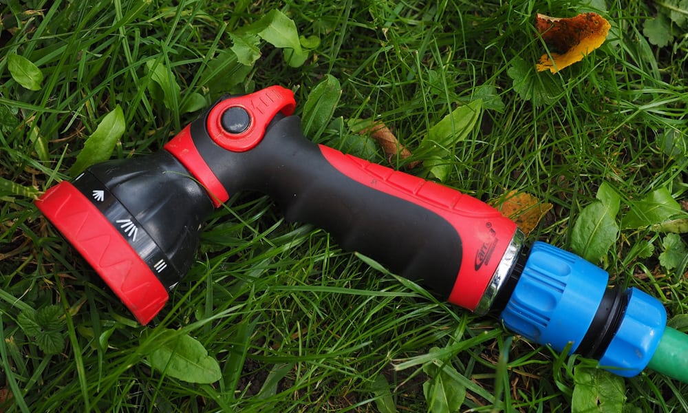 Red garden hose nozzle