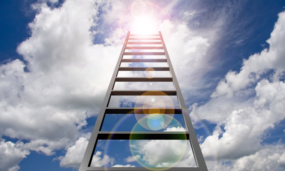 A ladder with blue sky with clouds