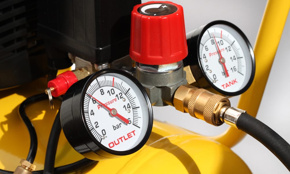 close up of two pressure gauges on a Air Compressor 