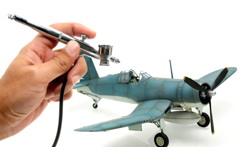 Airbrush painting a model plane