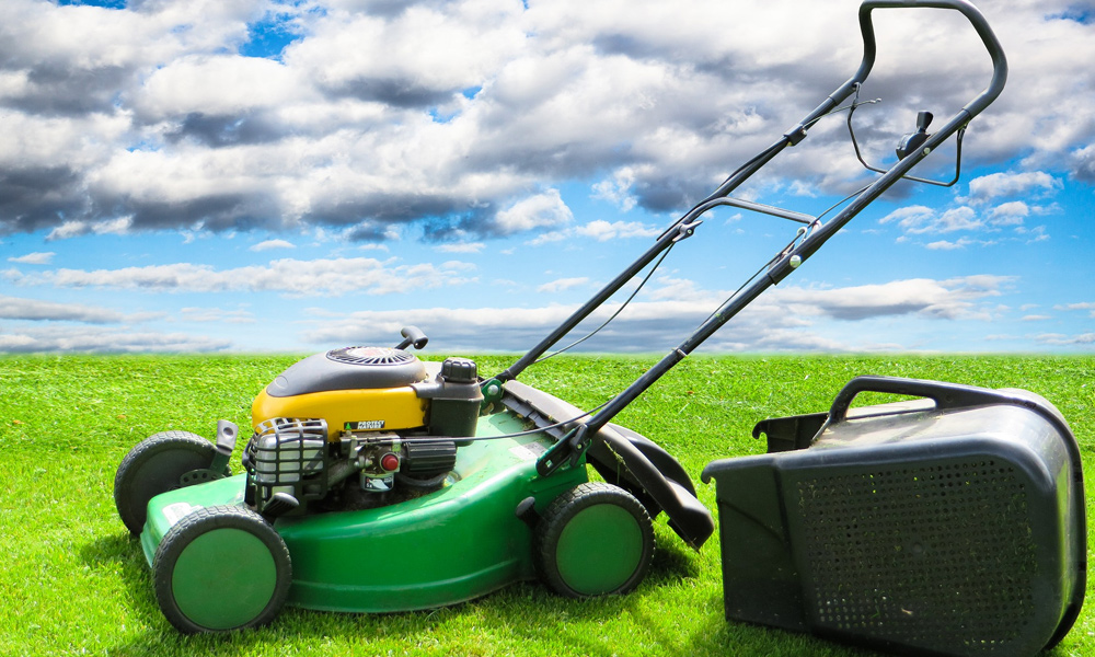 lawn mower with white clouds in the background