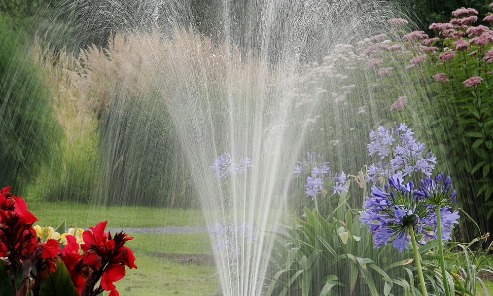 lawn Sprinkler watering a garden