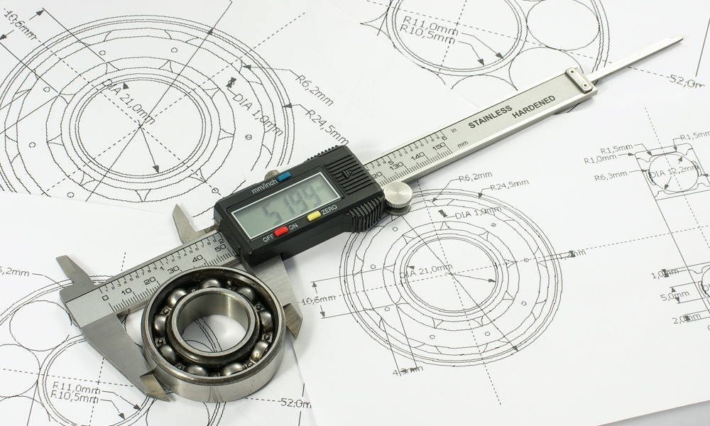 digital Caliper measuring a metal part