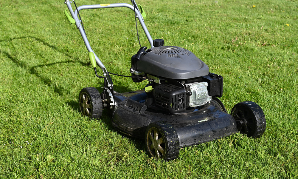 lawn mower on a fresh cut lawn