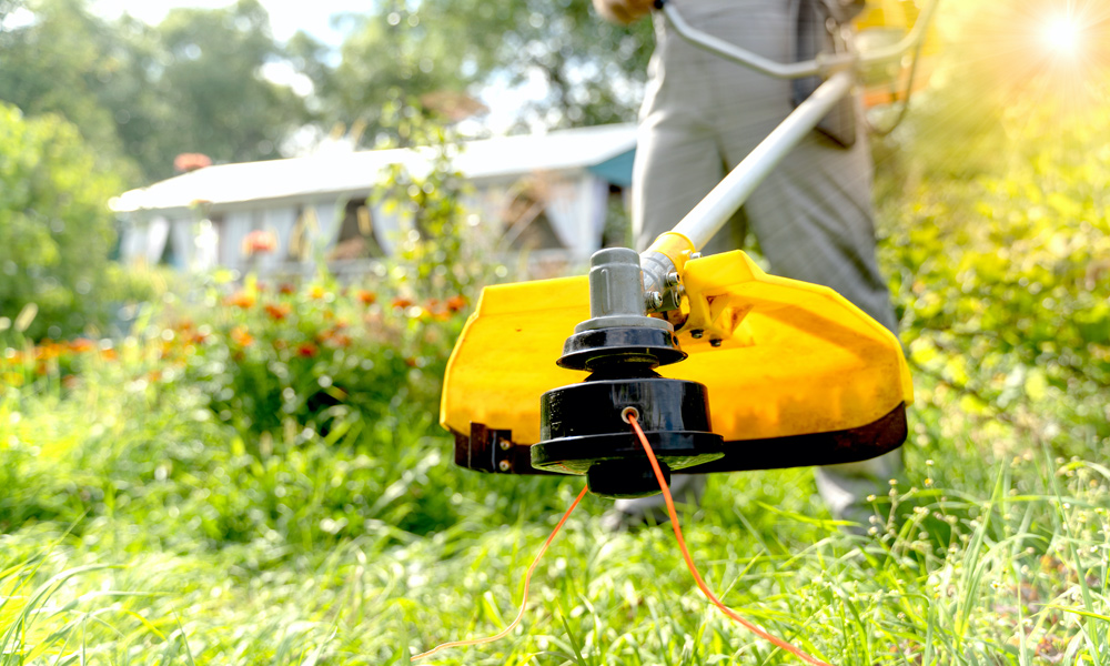 Yellow string trimmer showing trimmer Line